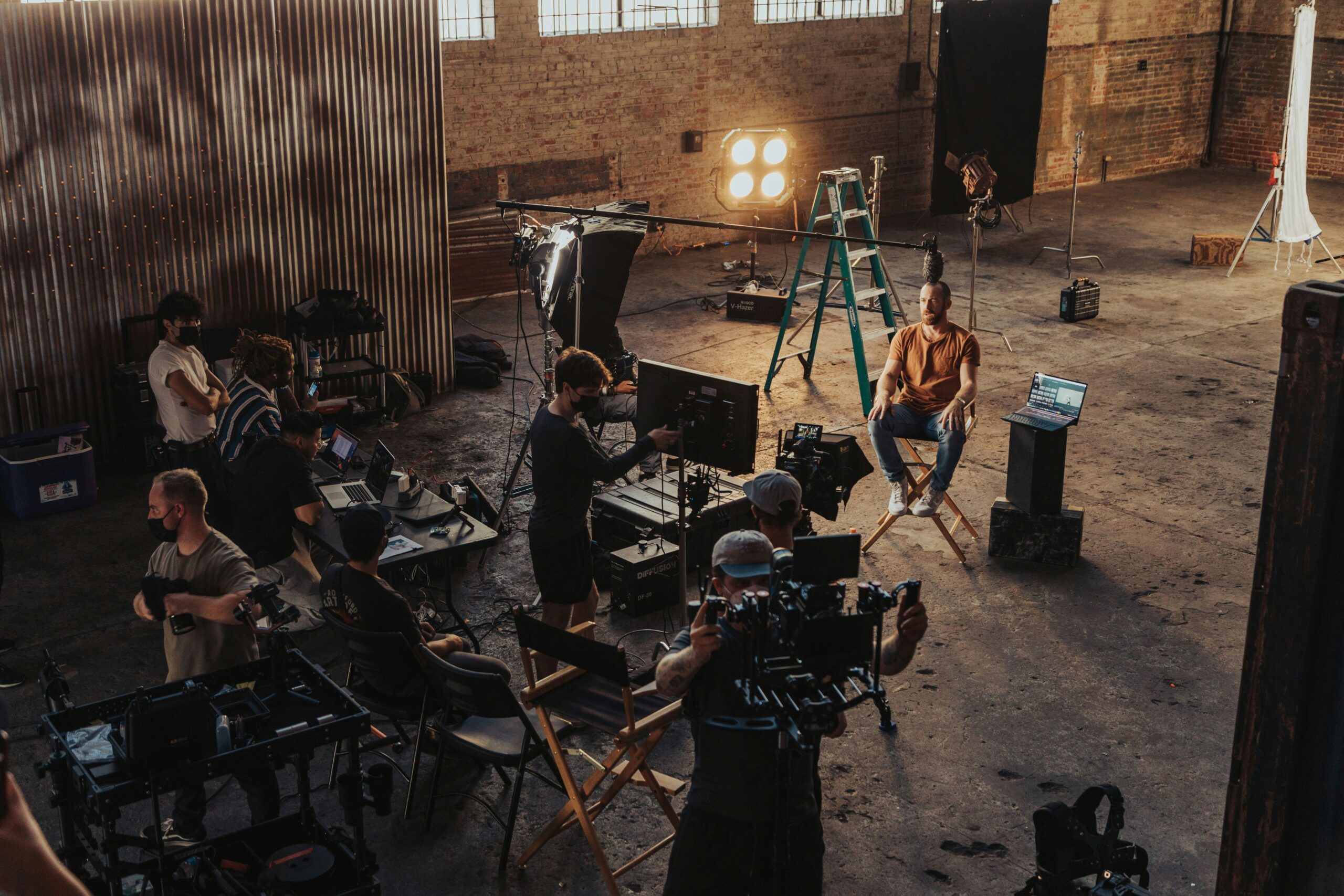 Filmmakers using AI-powered tools on a cinematic film set to direct an AI-generated movie